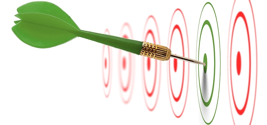 A green arrow hitting the center of a red and white target.